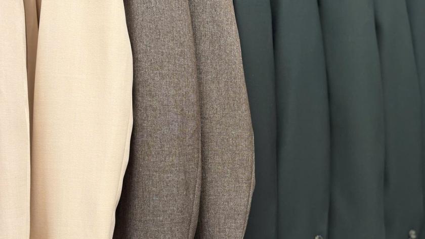 Suit fabric and jacket rack at We Are Suitable Singapore