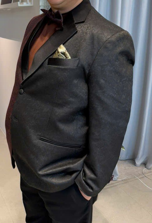 Black bespoke suit lapel and fit detail by We Are Suitable Singapore