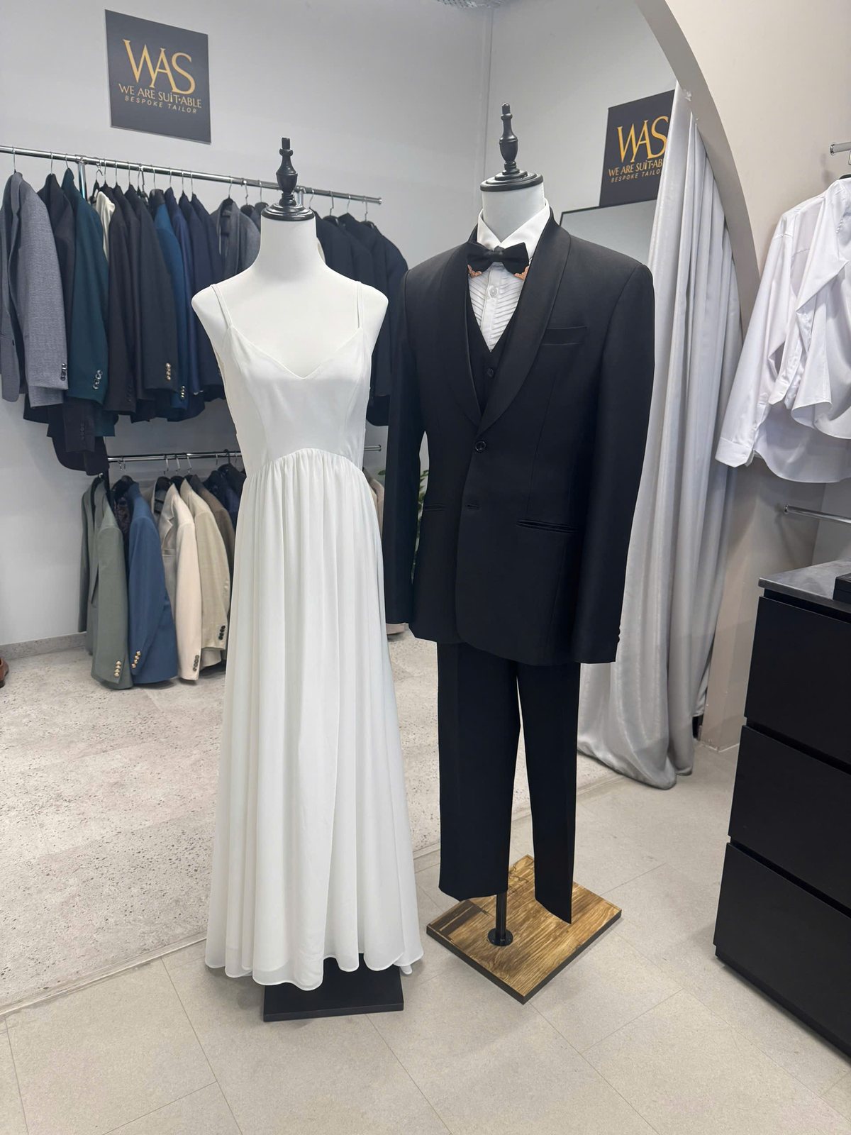 Wedding suit and gown display at We Are Suitable Singapore showroom
